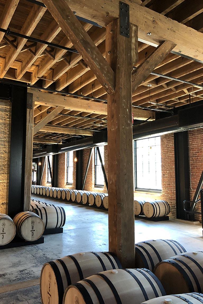 Savage and Cooke Distillery wood framing and barrels